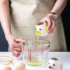 61F4fvOE03S._AC_SL1252_.jpg LuoCoCo Cute Egg Separator, Ceramics Vomiting Chicken Egg Yolk White Separator, Practical Household Small Egg Filter Splitter, Kitchen Gadget Baking Assistant Tool, Dishwasher Safe (Yellow)