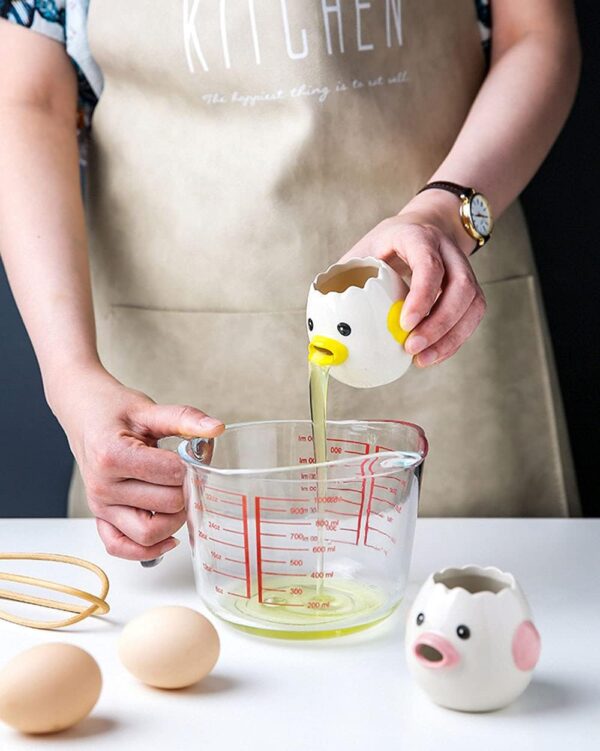 61F4fvOE03S._AC_SL1252_.jpg LuoCoCo Cute Egg Separator, Ceramics Vomiting Chicken Egg Yolk White Separator, Practical Household Small Egg Filter Splitter, Kitchen Gadget Baking Assistant Tool, Dishwasher Safe (Yellow)