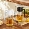 81OeI0fwrL._AC_SL1500_.jpg TrendPlain 16oz/470ml Glass Olive Oil Sprayer for Cooking – 2 in 1 Olive Oil Dispenser Bottle for Kitchen Gadgets and Air Fryer Accessories, Salad, BBQ - Black