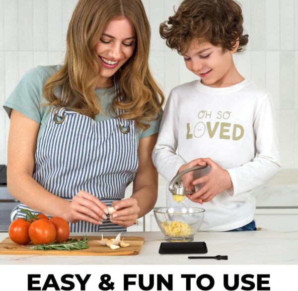 81qi-VSBYqL._AC_SL1500_.jpg Zulay Kitchen Premium Garlic Press Set - Rust Proof Professional Garlic Mincer Tool - Easy-Squeeze, Easy-Clean with Soft, Ergonomic Handle - Silicone Garlic Peeler & Brush (Silver)